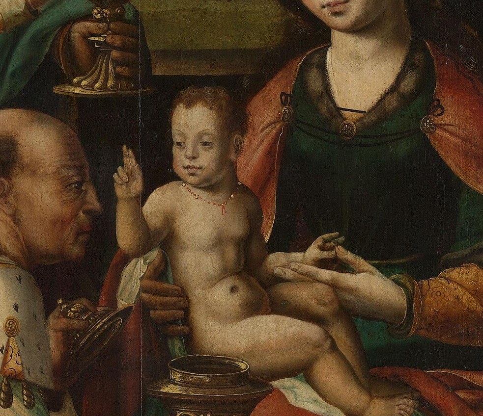 It shows the three kings presenting gifts to the infant Jesus.