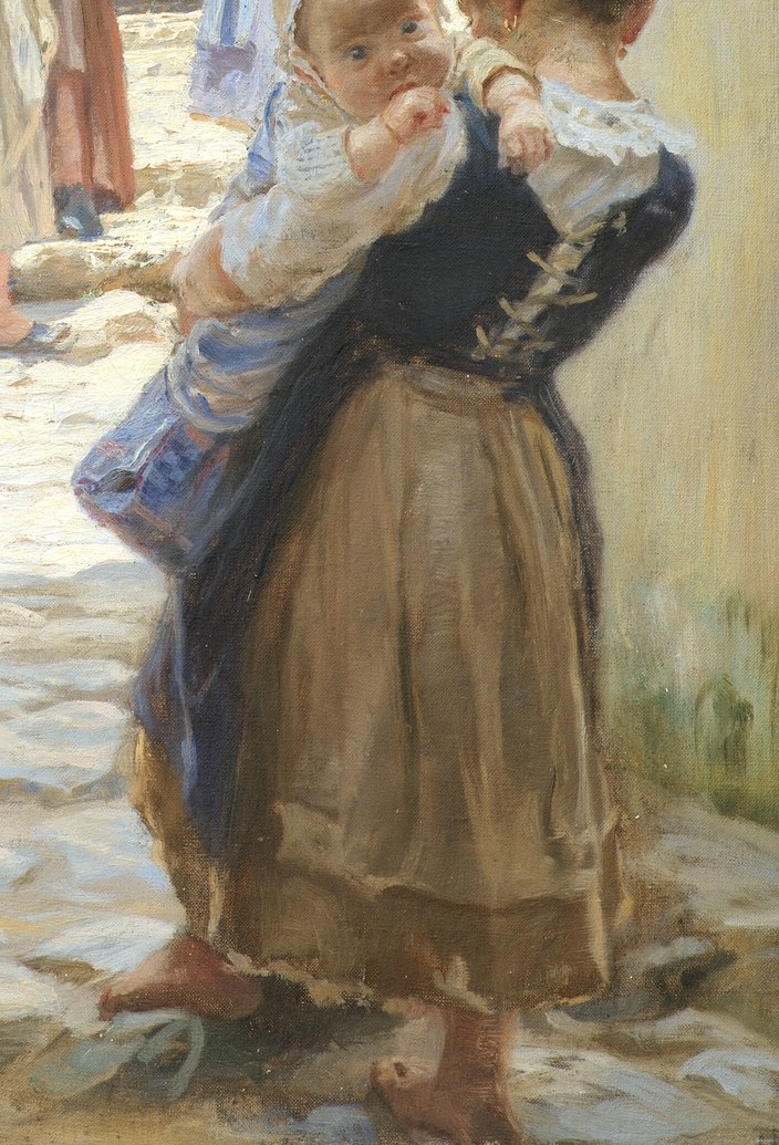 A young girl turns away from the viewer.