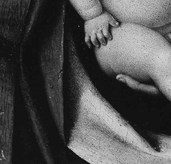 Look closely at the Christ Child's feet.