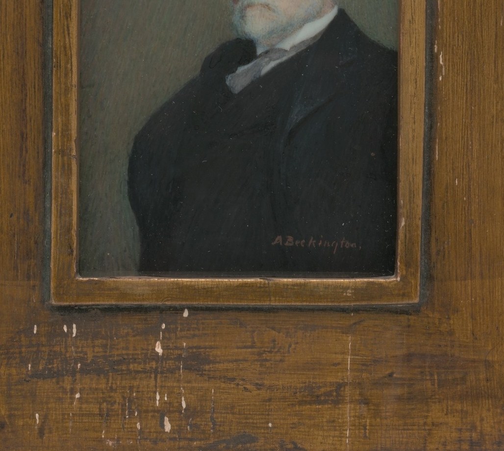 The dark coat signals a man of standing, around 1910.