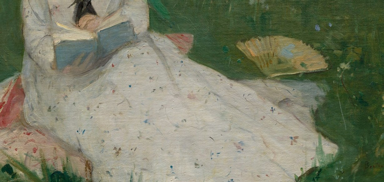 Her summer dress is light and patterned.