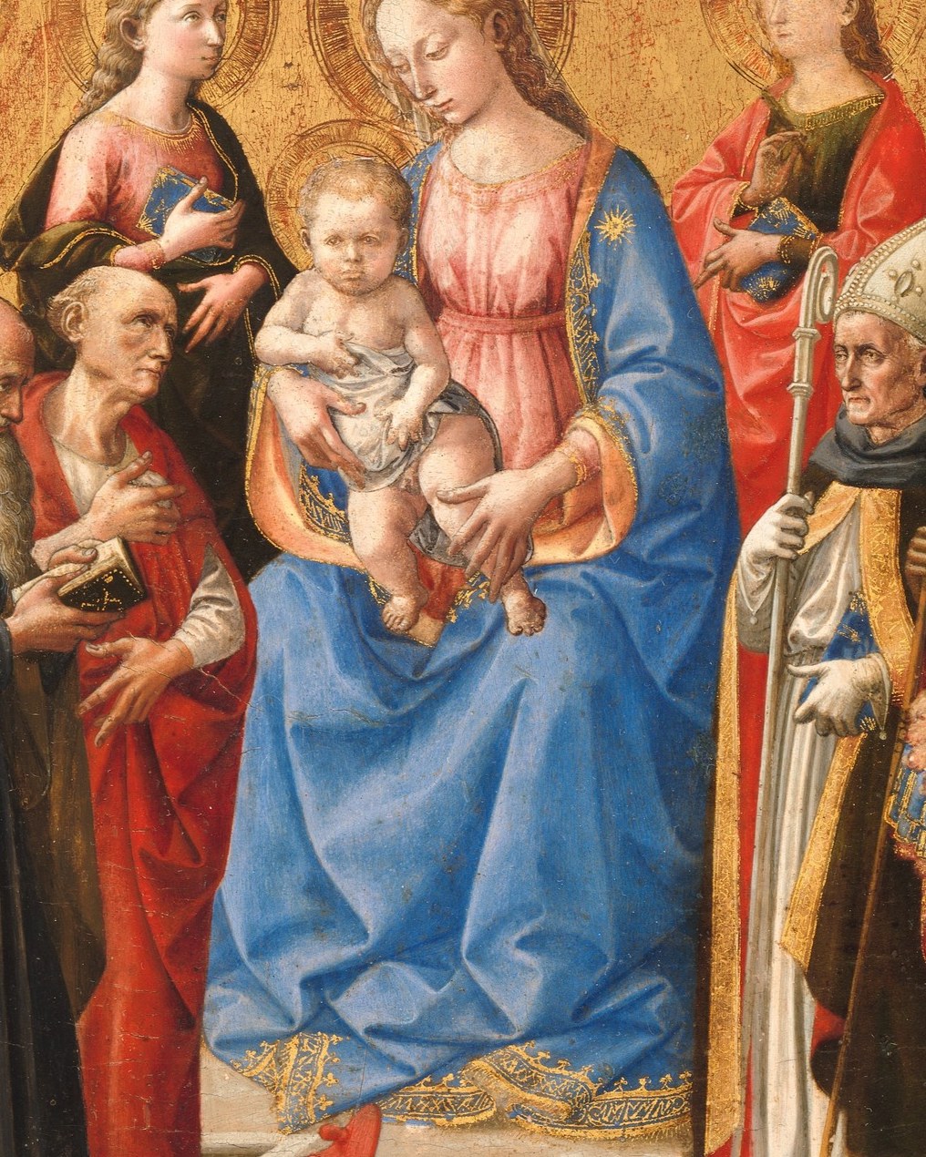The saturated ultramarine is expensive lapis lazuli, a deliberate status marker; the soft folds demonstrate Pesellino's miniaturist precision in rendering drapery.