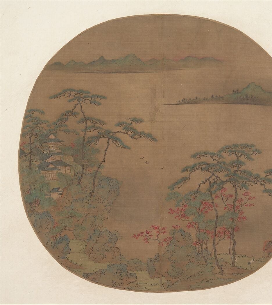 The round format compresses a panoramic landscape into a single contained breath; the composition must curve with the format, a formal constraint that distinguishes fan painting from scroll or hanging-scroll work.