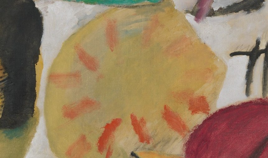 The yellow circle with red marks at the center, a sun or flower.