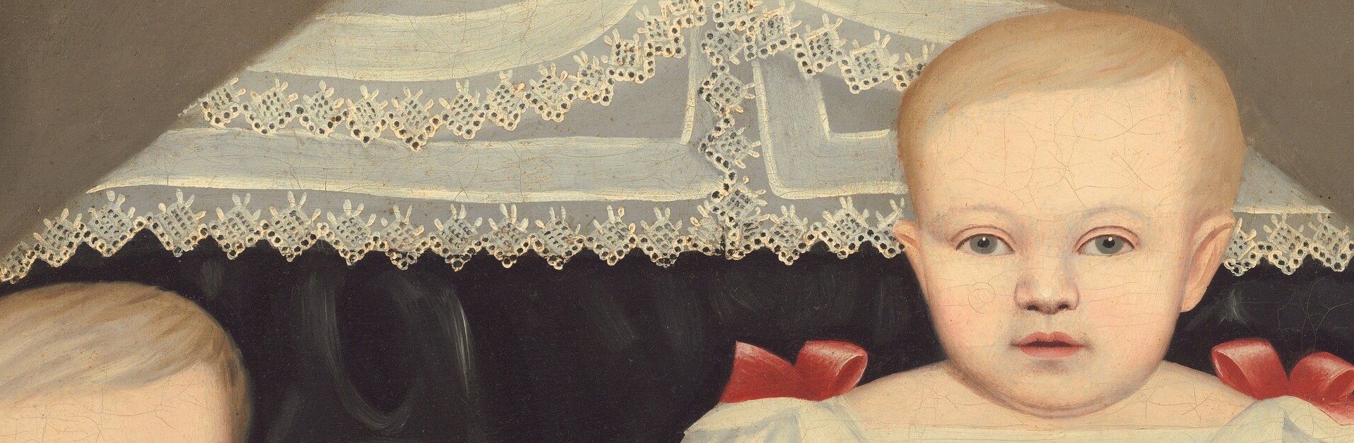 Notice her lace collar. This detail was very fashionable.