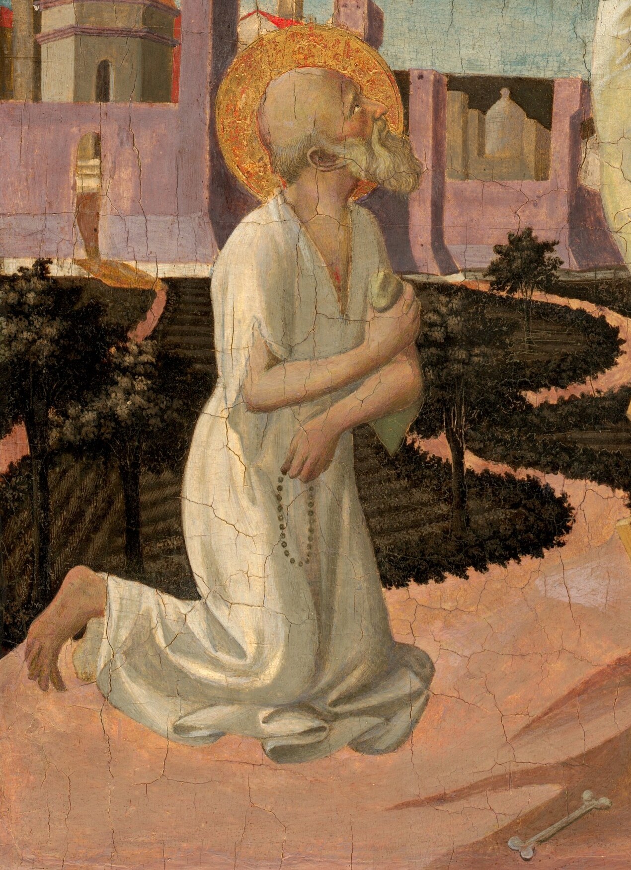 Saint Jerome, known for translating the Bible, kneels here.