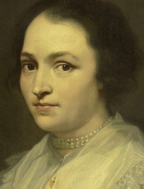 Her portrait shows a woman of refined elegance.