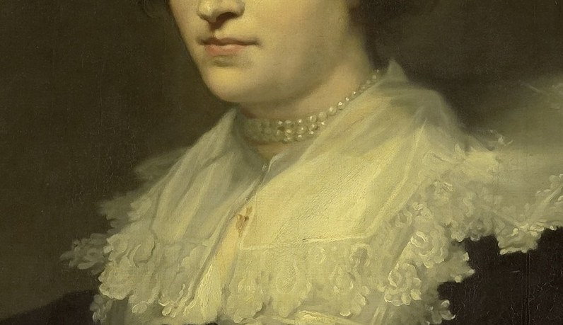 Notice her elaborate lace collar and pearl necklace.