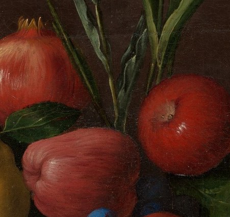 A split pomegranate: the Counter-Reformation symbol of resurrection.