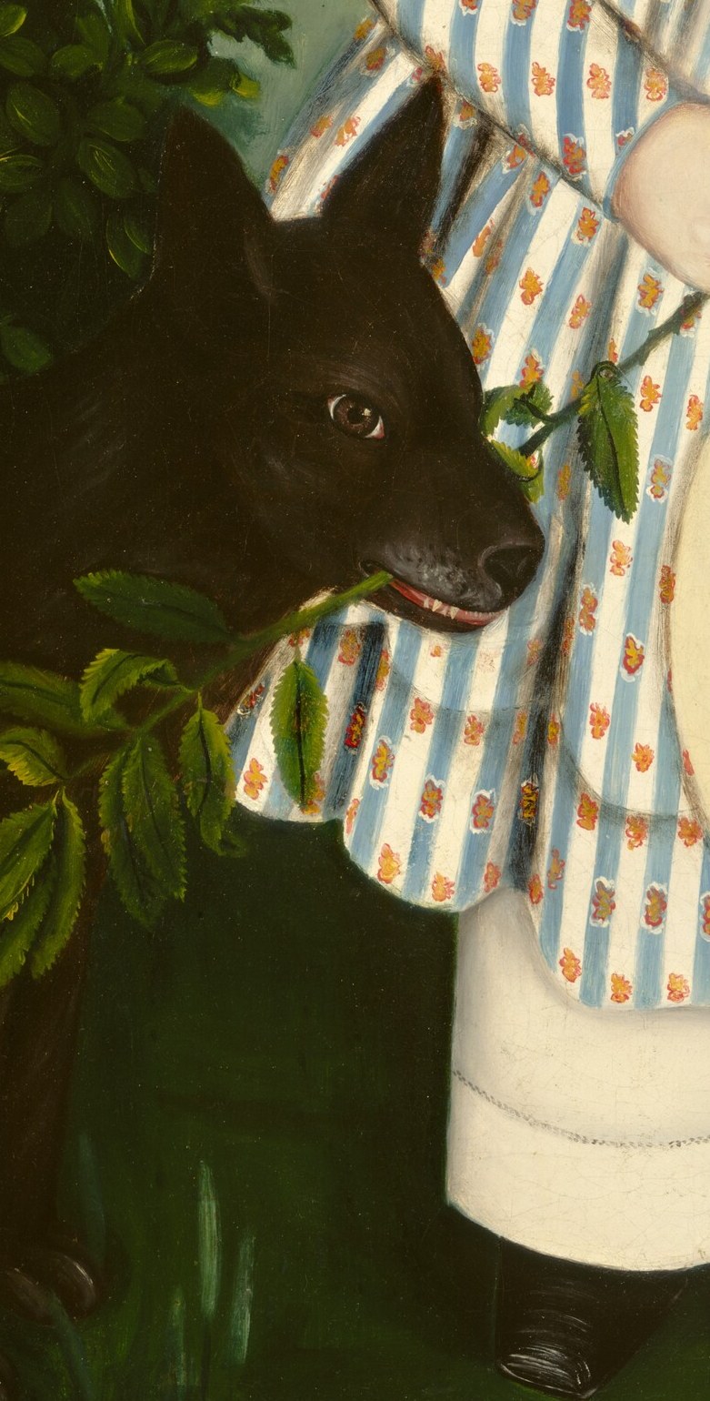 Now, look at the black dog beside the child.