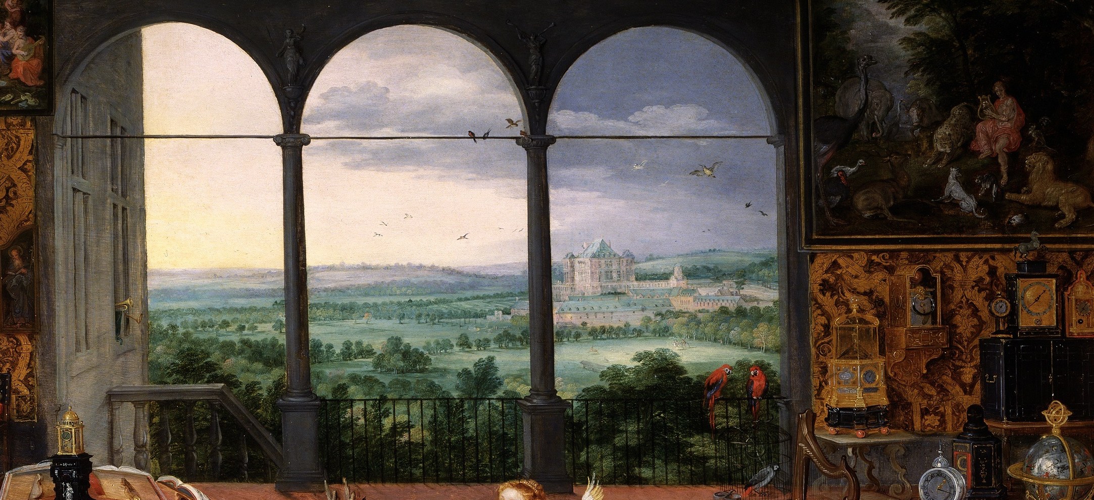Jan Brueghel's signature aerial landscape vista , the contrast between the sound-filled cluttered interior and the silent open distance creates the painting's emotional scale