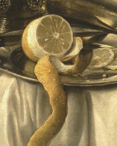 Look closely at the peeled lemon and its spiral rind.