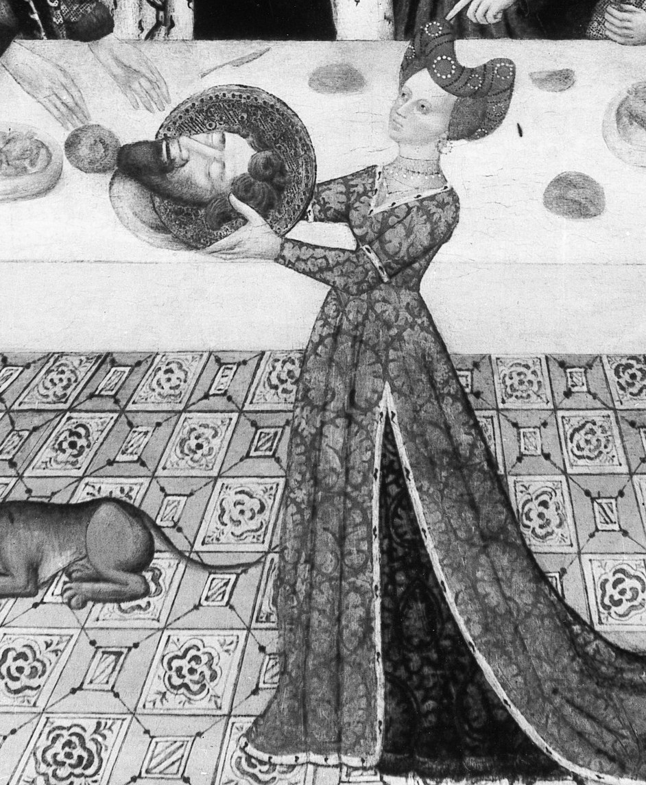 The pivotal narrative figure , her arched-back posture of offering creates dramatic tension between beauty and horror; her elaborate gown and jeweled headdress contrast sharply with her grim cargo.