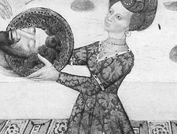 The moral and visual center of the painting; the head held aloft draws every sightline in the composition, making the viewer complicit in the act of looking.