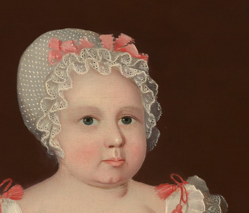 The quintessential folk-portrait stare , wide-eyed, unsmiling, direct , that reads as both innocence and uncanny gravity; the expression defies the child's age and arrests the viewer.