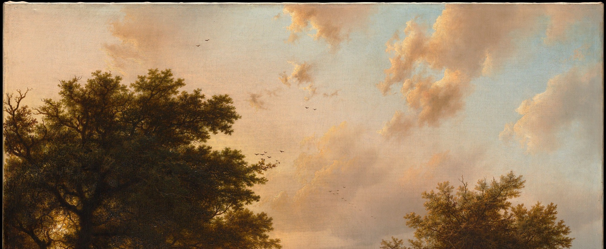 The soft hues of the sunset sky create a peaceful mood.