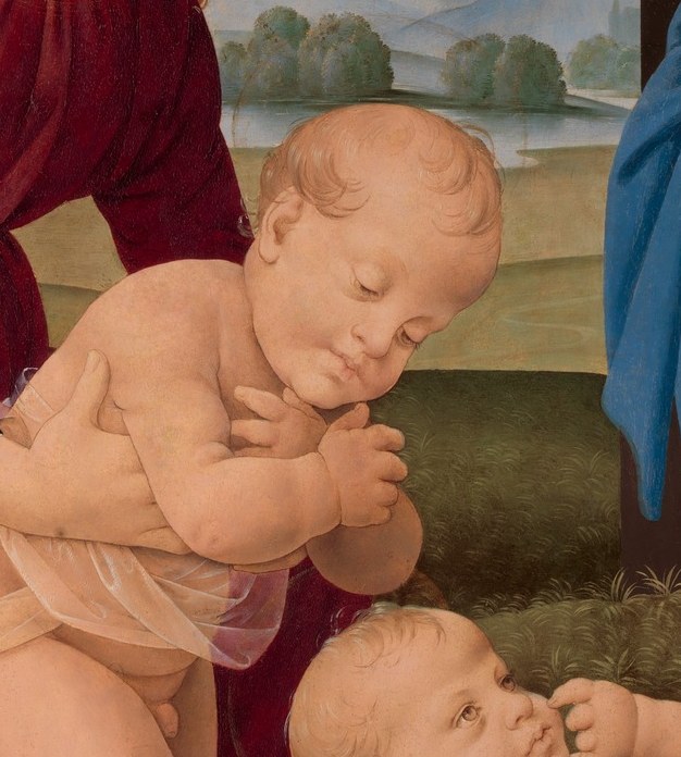 Without that crimson sash, he is just another infant.