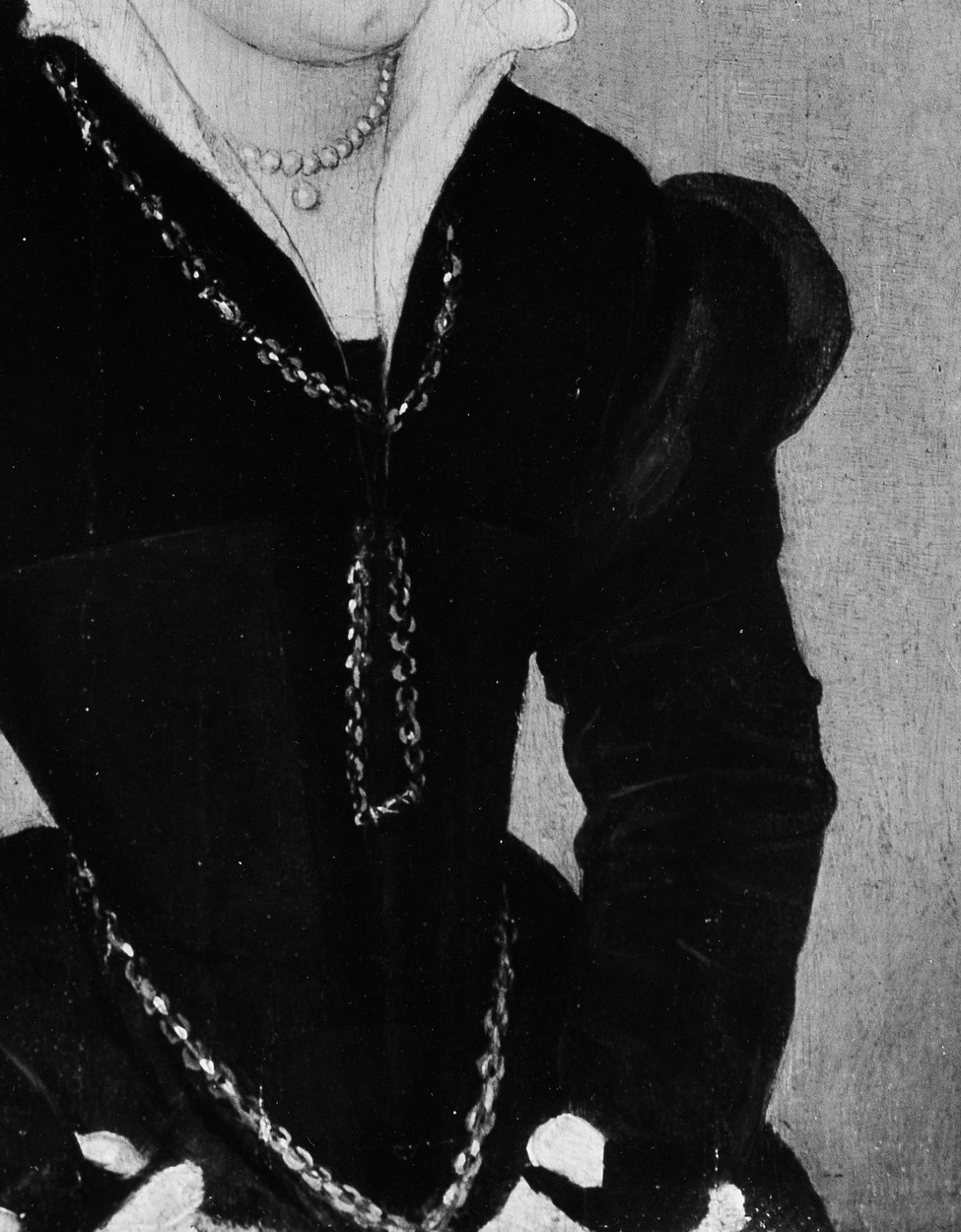 Her dark clothes and hat are traditional signs of mourning.