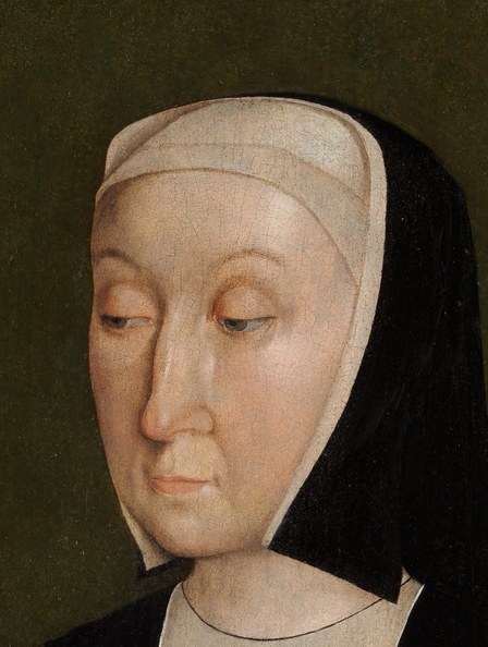 Her downward gaze is quiet, reserved.