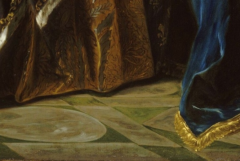 Look closely at the luxurious ermine trim on her robe.