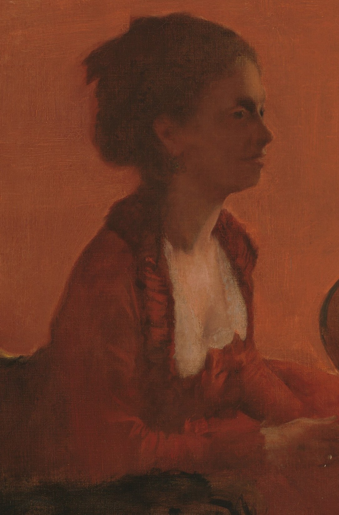 This woman seems lost in thought, avoiding our gaze.