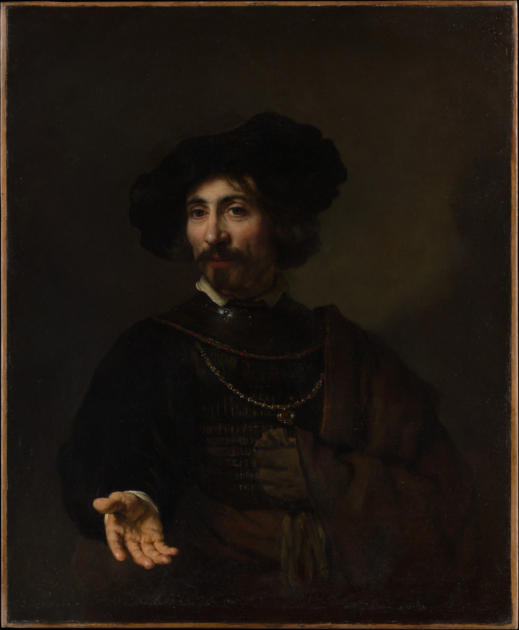 The deep shadows push the figure forward, creating a sense of intimacy and focus.