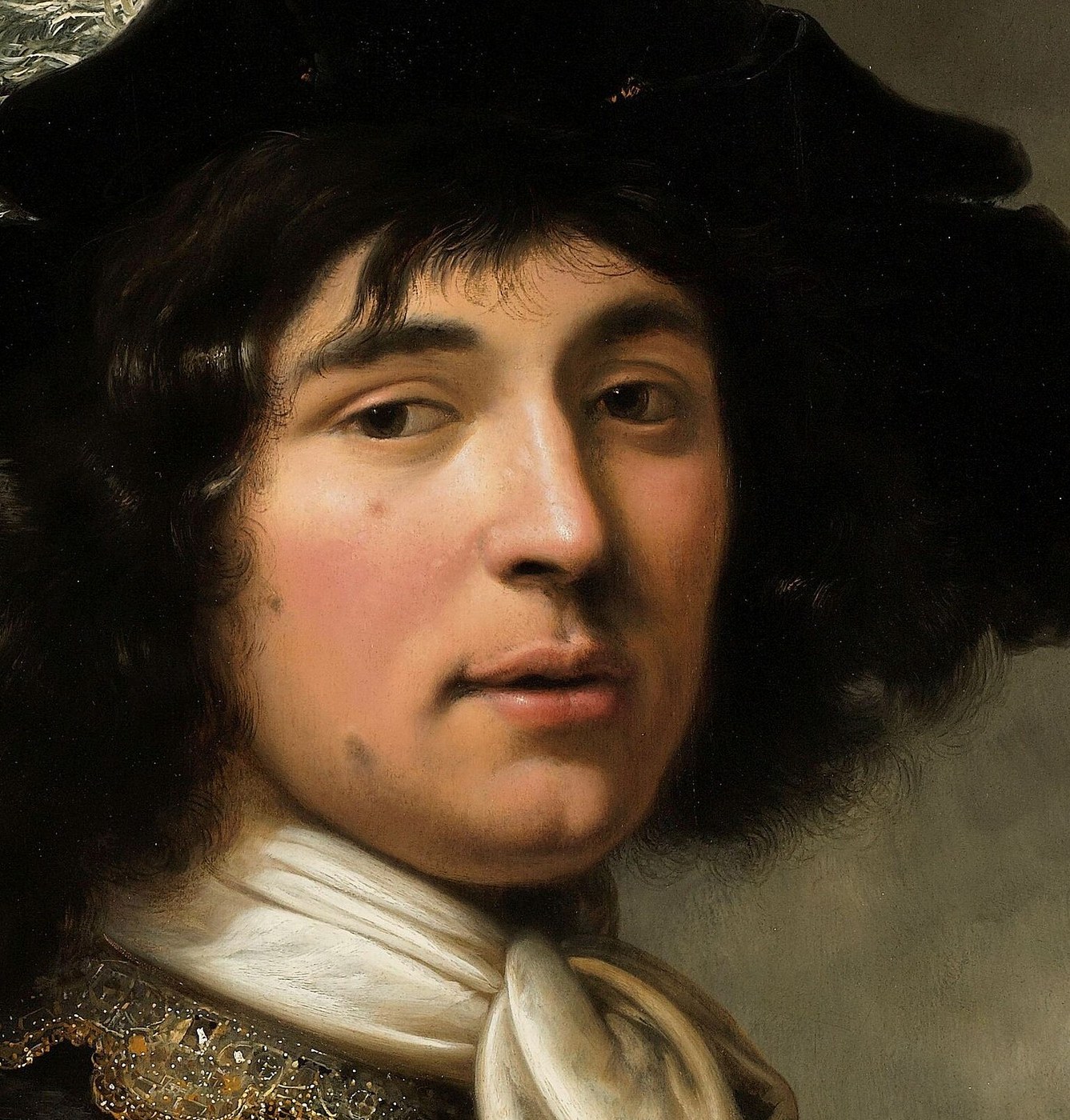 This young man has a confident, direct gaze.