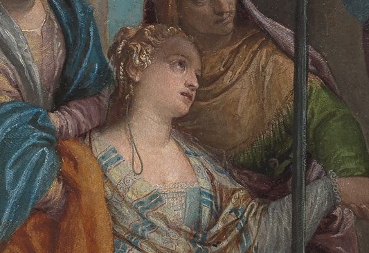 Her posture of supplication and grief is palpable.
