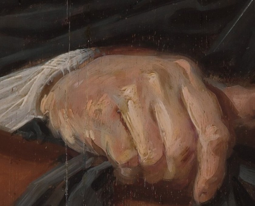 His hands suggest a thoughtful disposition.