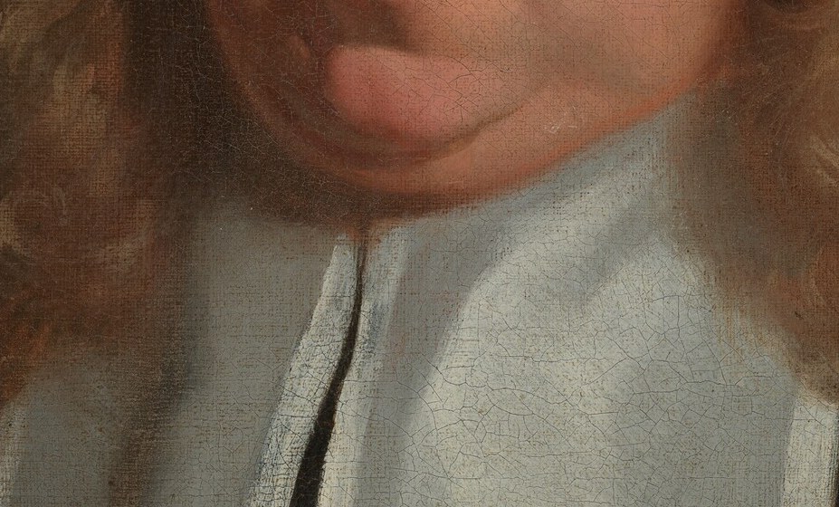 Crisp white fabric against dark clothing, highlighting the sitter's formal attire and profession.