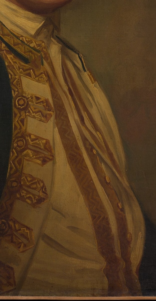 His sash indicates military command.