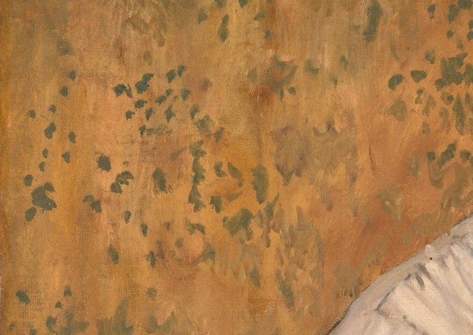 Behind her, beyond the interior, are hints of green foliage.