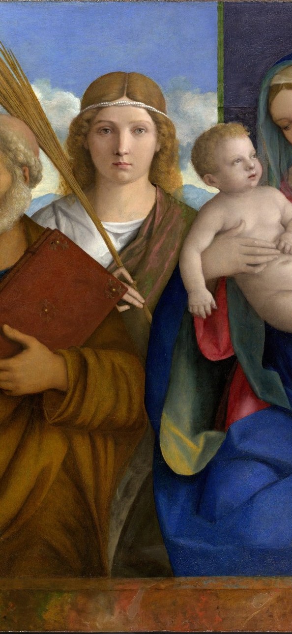 The palm is an unambiguous martyrdom symbol; her golden attributes and composed posture make her a decoder anchor for the entire left half of the composition.