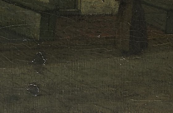 Over a century, the oil paint has cracked with age.