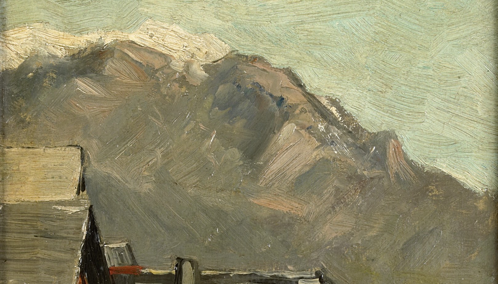 The imposing mountain range dominates the background, conveying a sense of scale and the grandeur of nature.