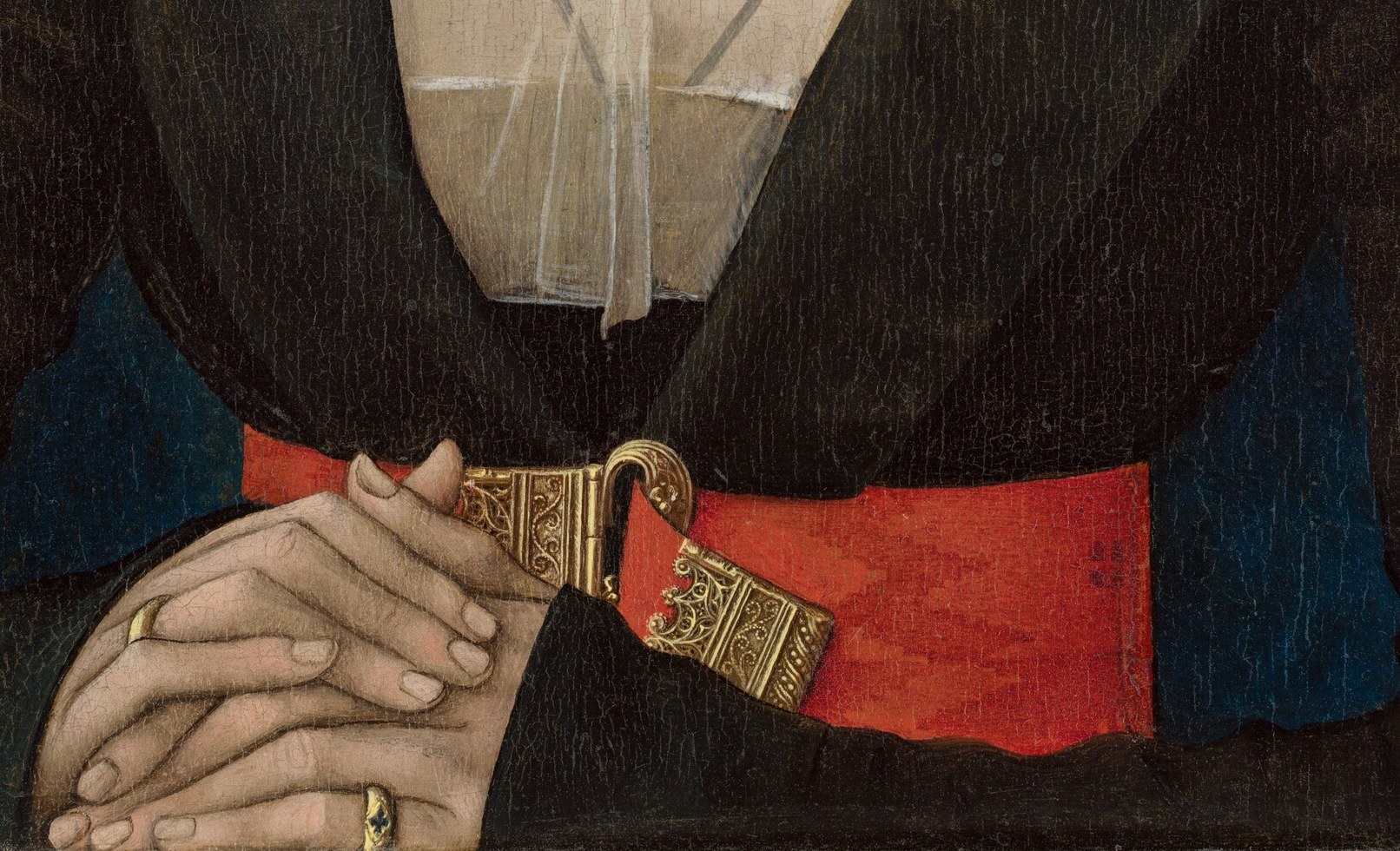 But look at her hands, tightly interlaced at the frame.