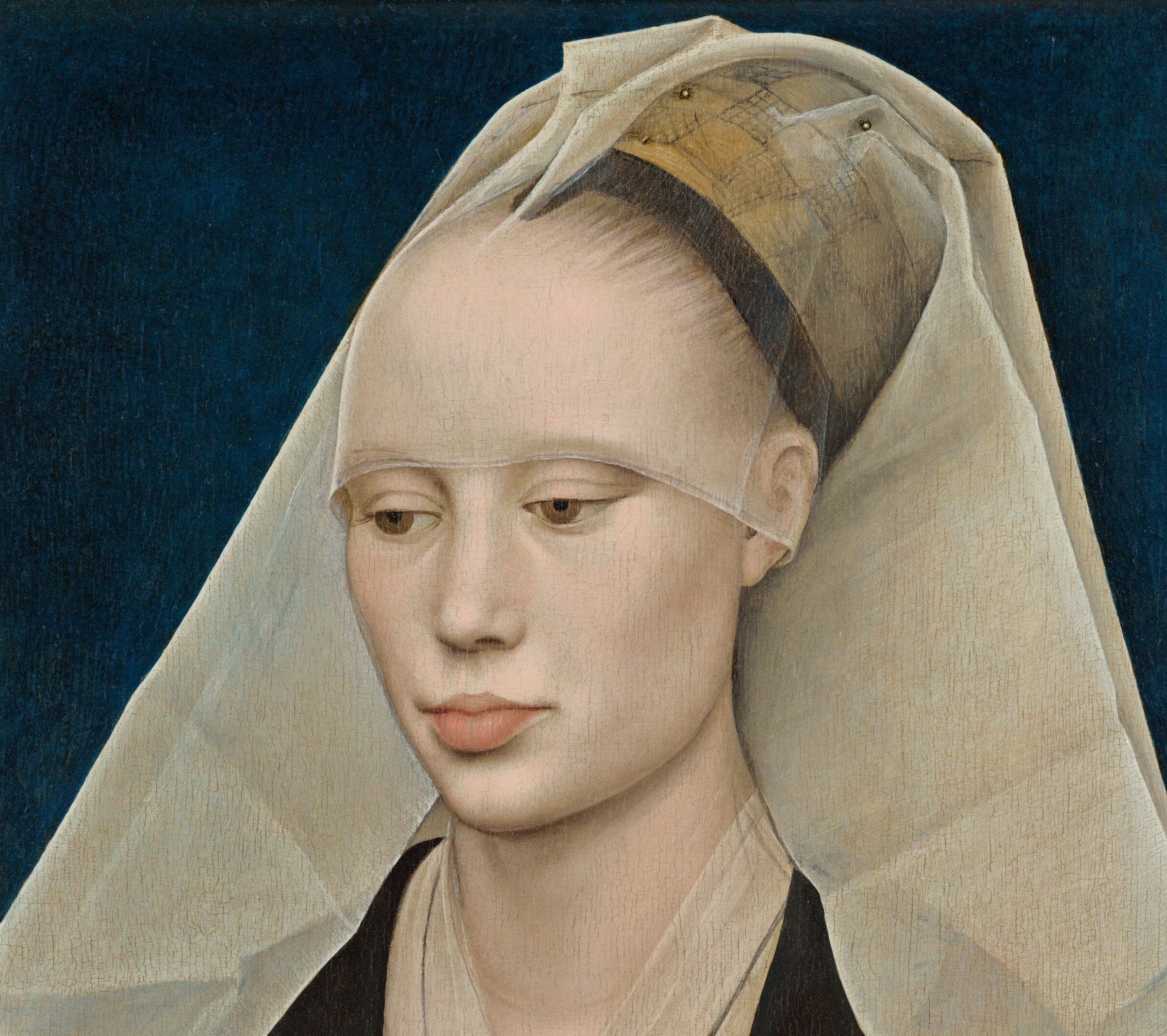 The painter built the whole composition on these sharp geometric folds.