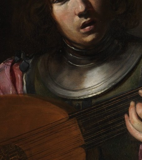 Look at his polished breastplate, a sign of his profession.
