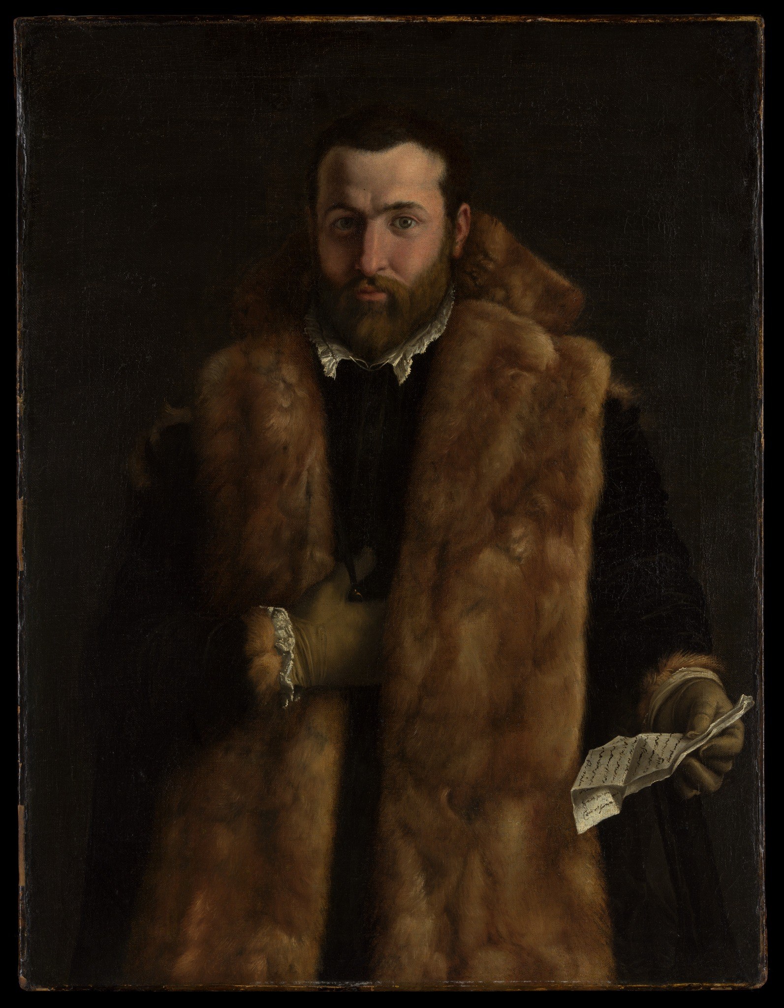 The deep, almost black background makes the figure and his opulent clothing stand out dramatically.