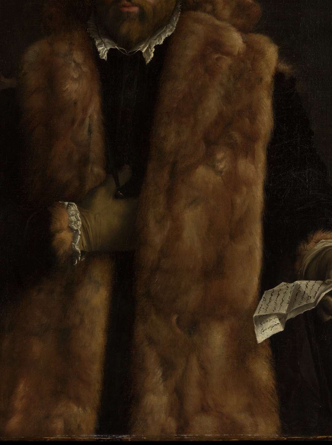 His fur-trimmed coat speaks of wealth and status.