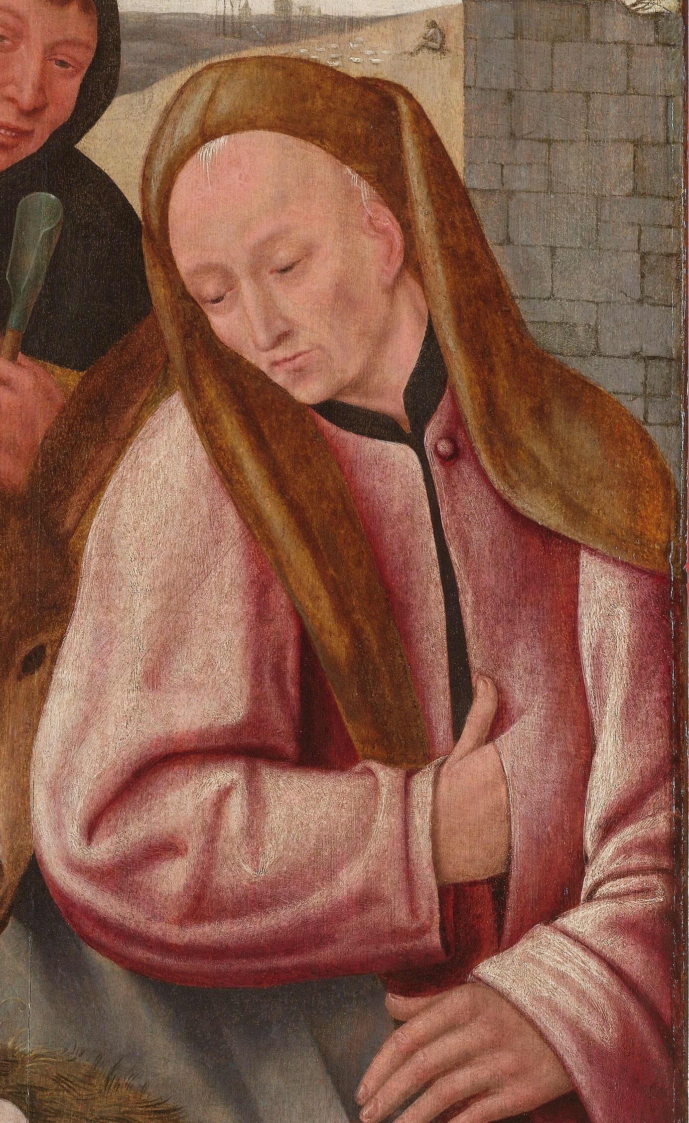 But the other woman holds a small mirror.