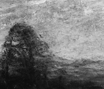 Provides a strong vertical anchor and contrast to the horizontal landscape, hinting at the foreground.