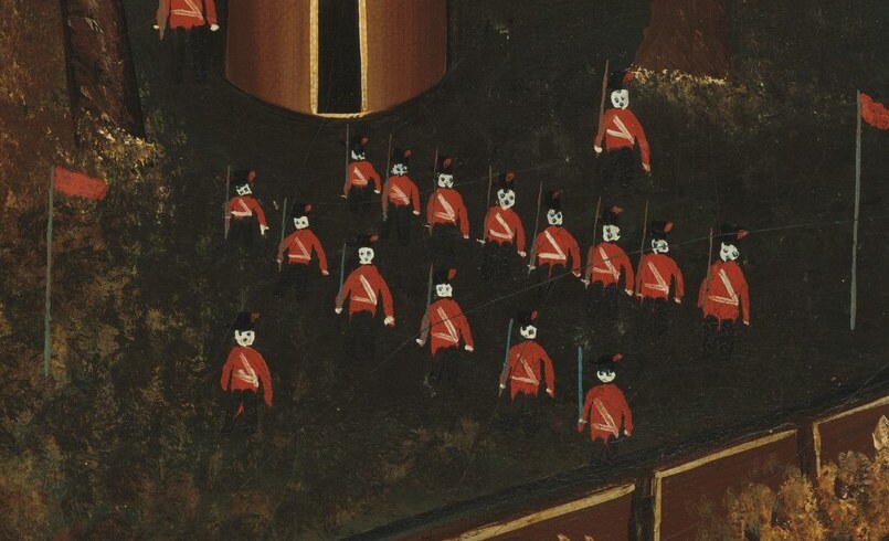 A line of red-uniformed soldiers marches into view.