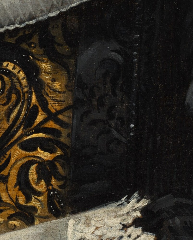 Her wealth is clear, from the gold embroidery to her pearl earring.