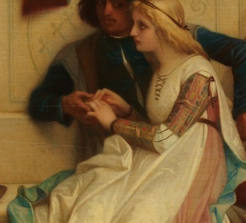 He holds the woman's hand gently.