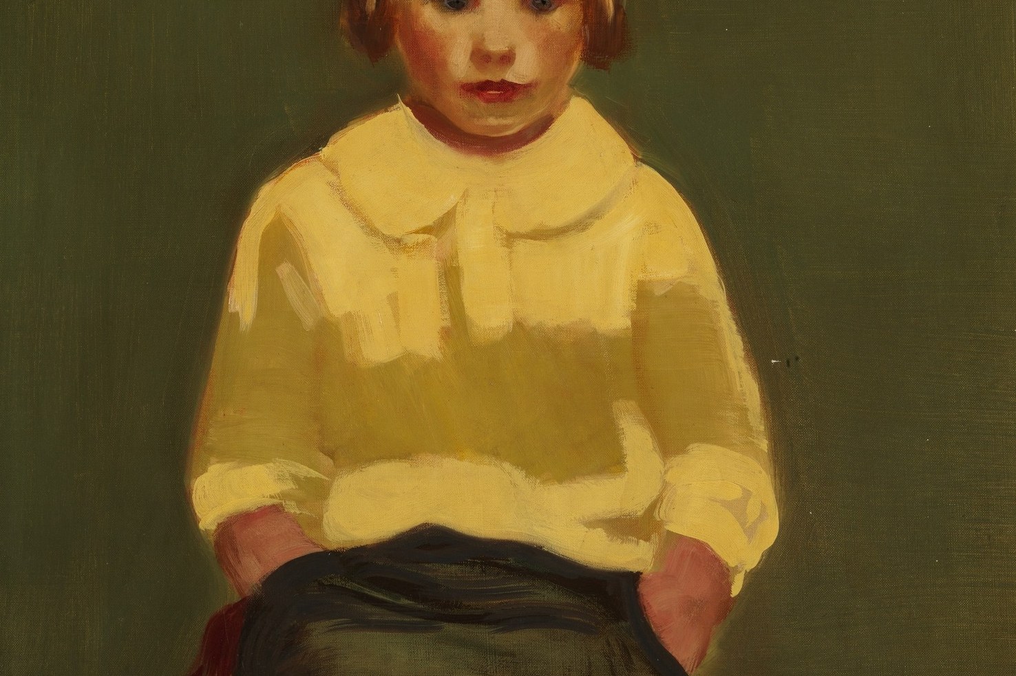 A bright yellow sweater against the dark.