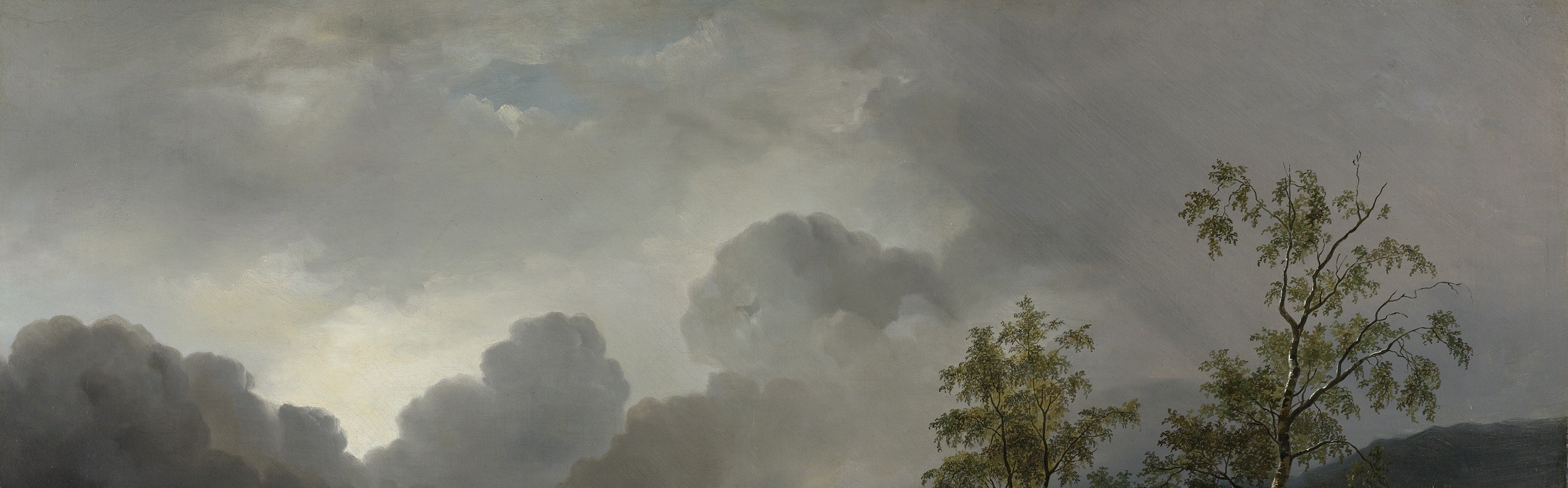The low, heavy clouds press down on the landscape.