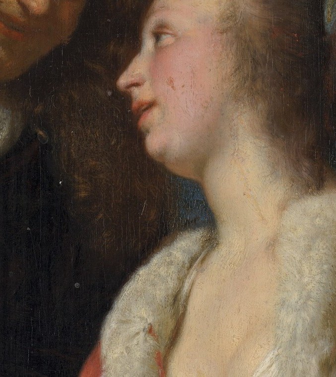 Her gaze is directed at the man, suggesting engagement and perhaps a shared intimacy.