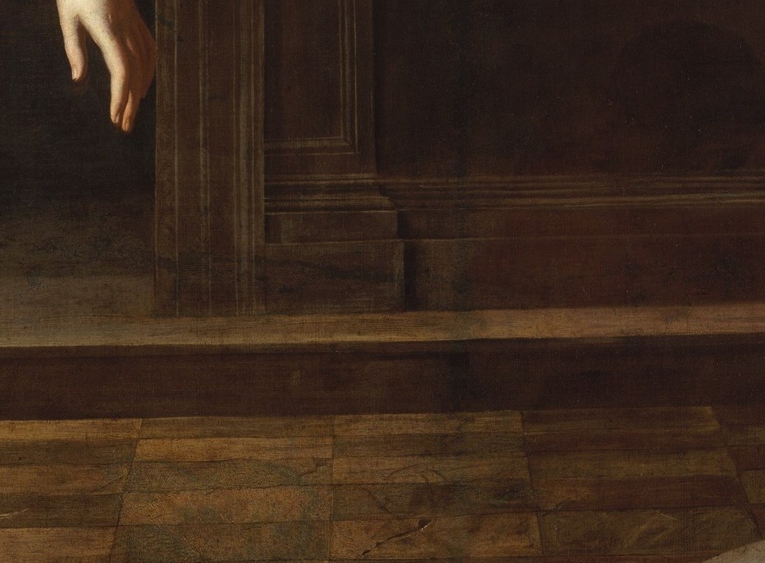 Her hands reach across the void, pleading, but not cowering.