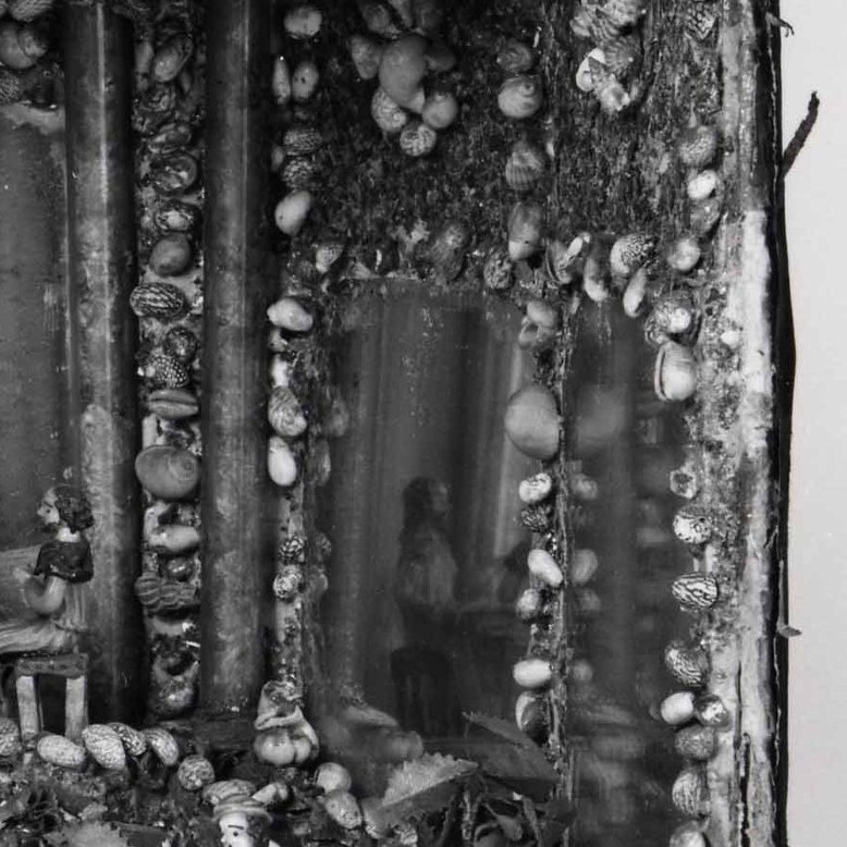 Mirrors the left side, reinforcing the unusual decorative scheme and creating a sense of enclosure.